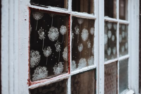 Old wooden window with spray ornaments - free stock photo