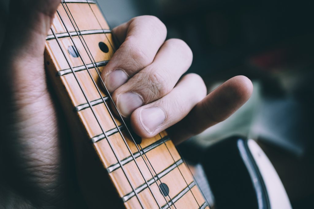 guitarist_hand_playing_guitar-1024x683.j