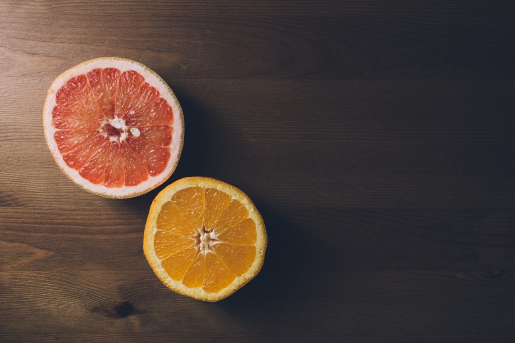 Grapefruit and orange cut in half 2 - free stock photo