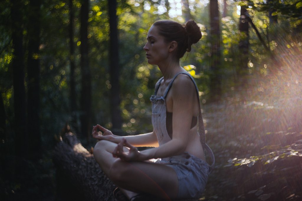 Helios shot of a girl meditating 2 - free stock photo