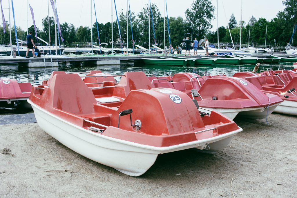 Paddle boats at the lake harbor - free stock photo