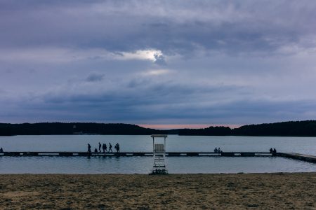 People standing on the pier at dusk - free stock photo