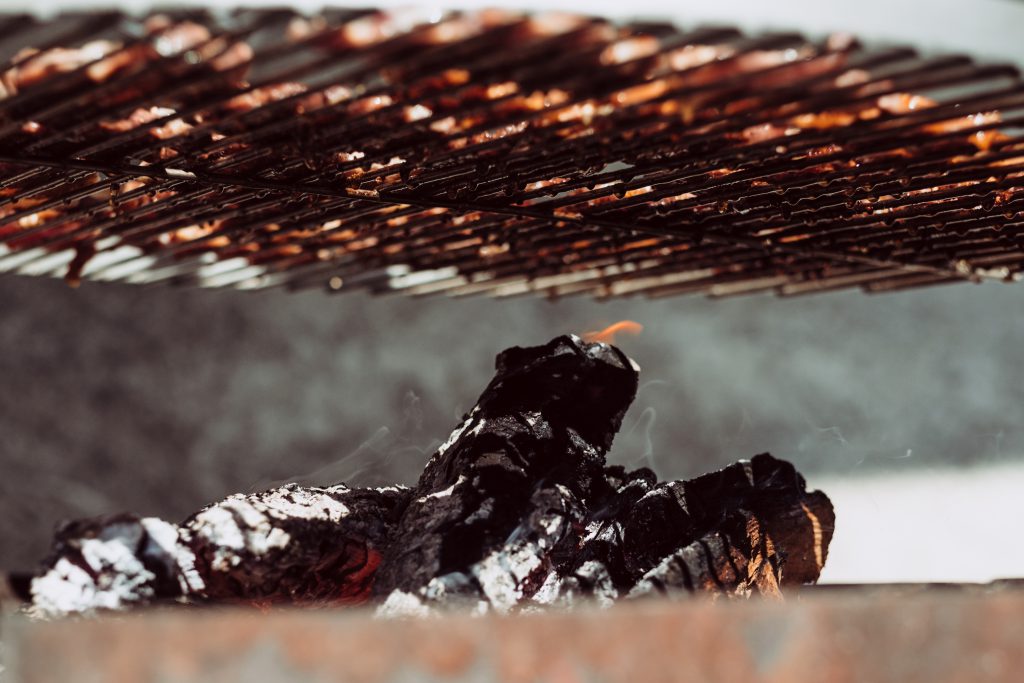 Wood burning under the grill - free stock photo