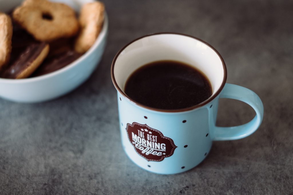 Black coffee and biscuits - free stock photo