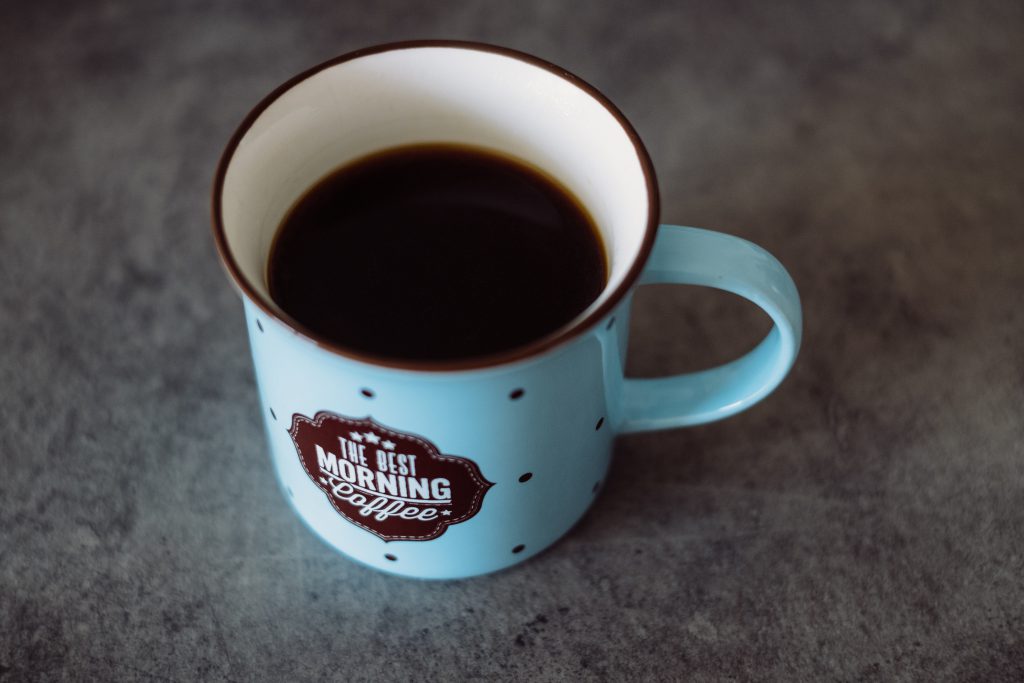 Black coffee in a retro mug - free stock photo