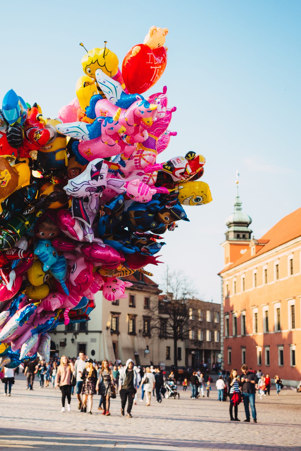 Helium cartoon balloons in the city Old Town - free stock photo