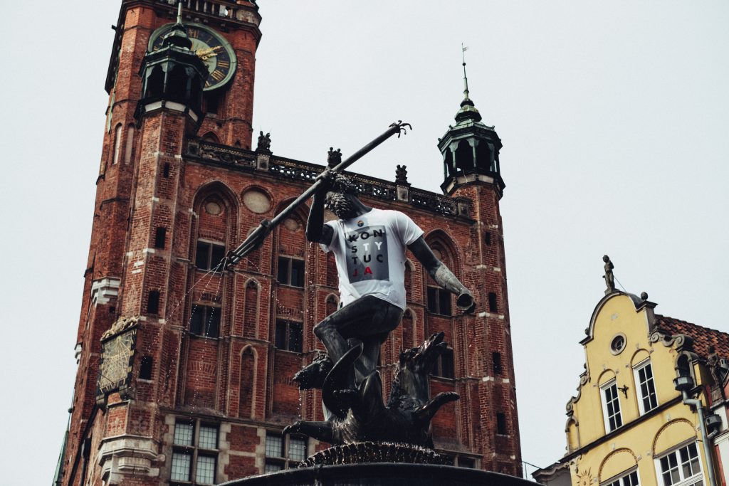 Statue of Neptune in a T-shirt - free stock photo