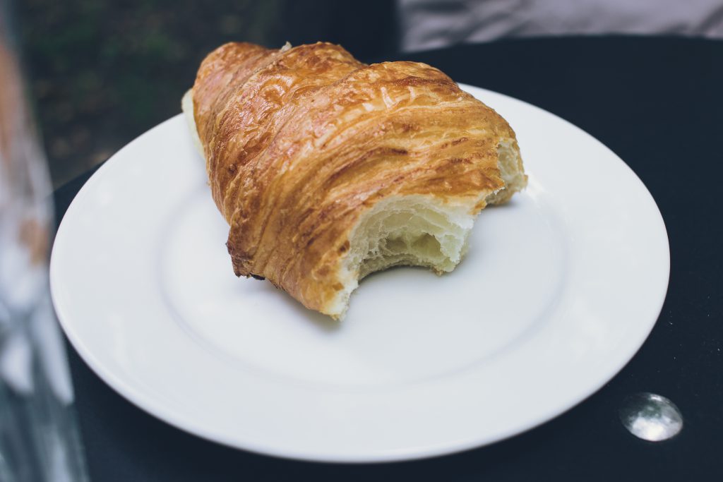 bitten_butter_croissant_on_a_plate-1024x