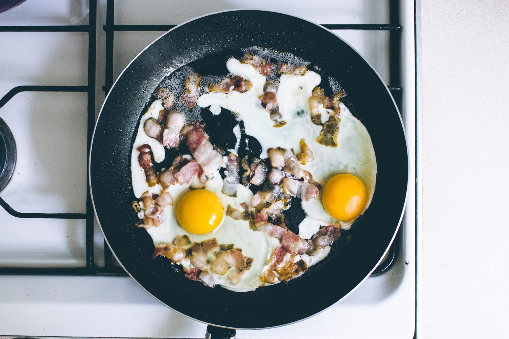 Eggs and bacon on the frying pan - free stock photo