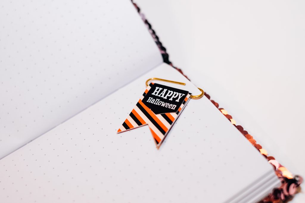 Happy Halloween paperclip in a notebook - free stock photo