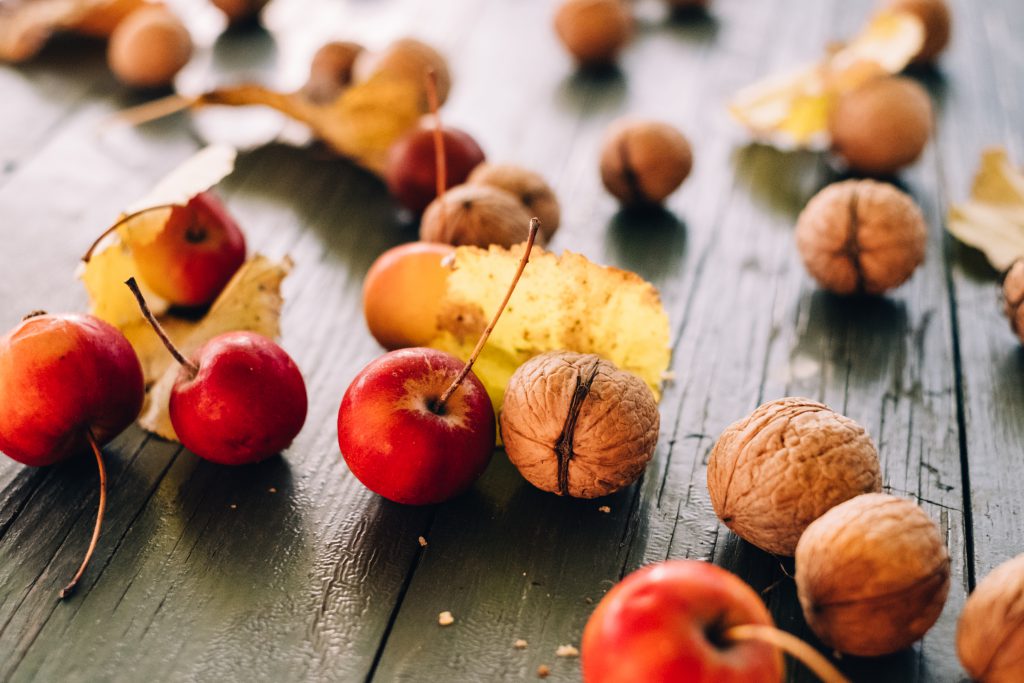 Mini apples and walnuts - free stock photo