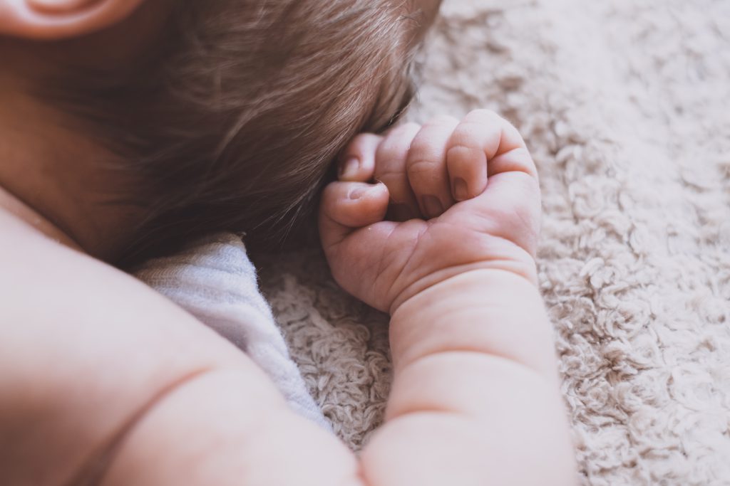 Newborn baby’s arm - free stock photo