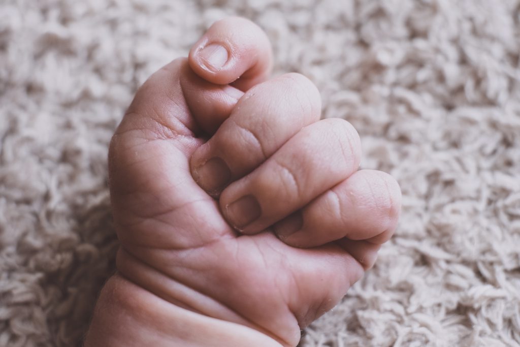 Newborn baby’s fist - free stock photo
