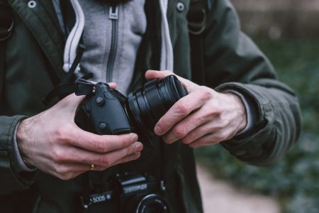 Man with two cameras over his neck 2 - free stock photo