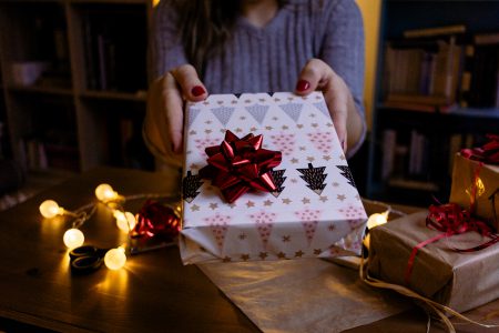 A female holding a christmas gift 3 - free stock photo
