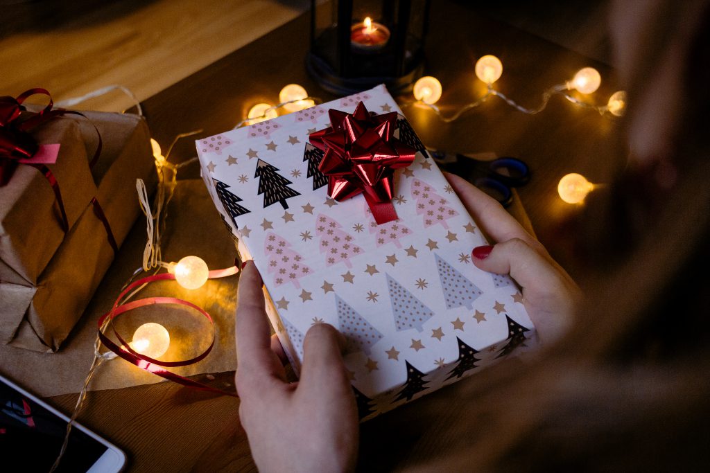 female_holding_a_christmas_gift_6-1024x683.jpg