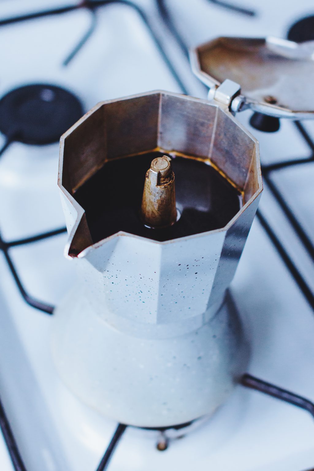 Brewing black coffee in a percolator - free stock photo