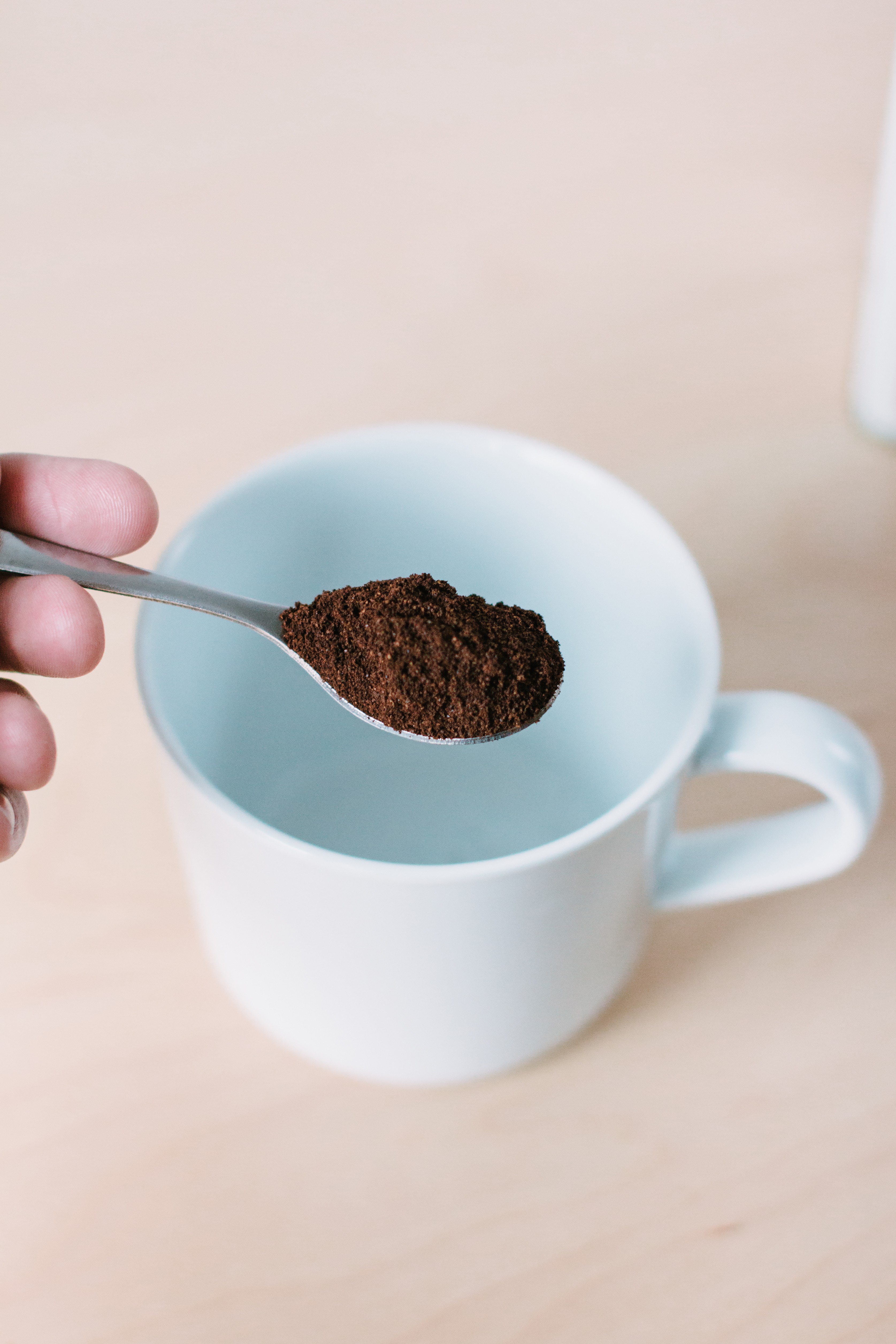 Ground coffee in a spoon 2 Free stock photo