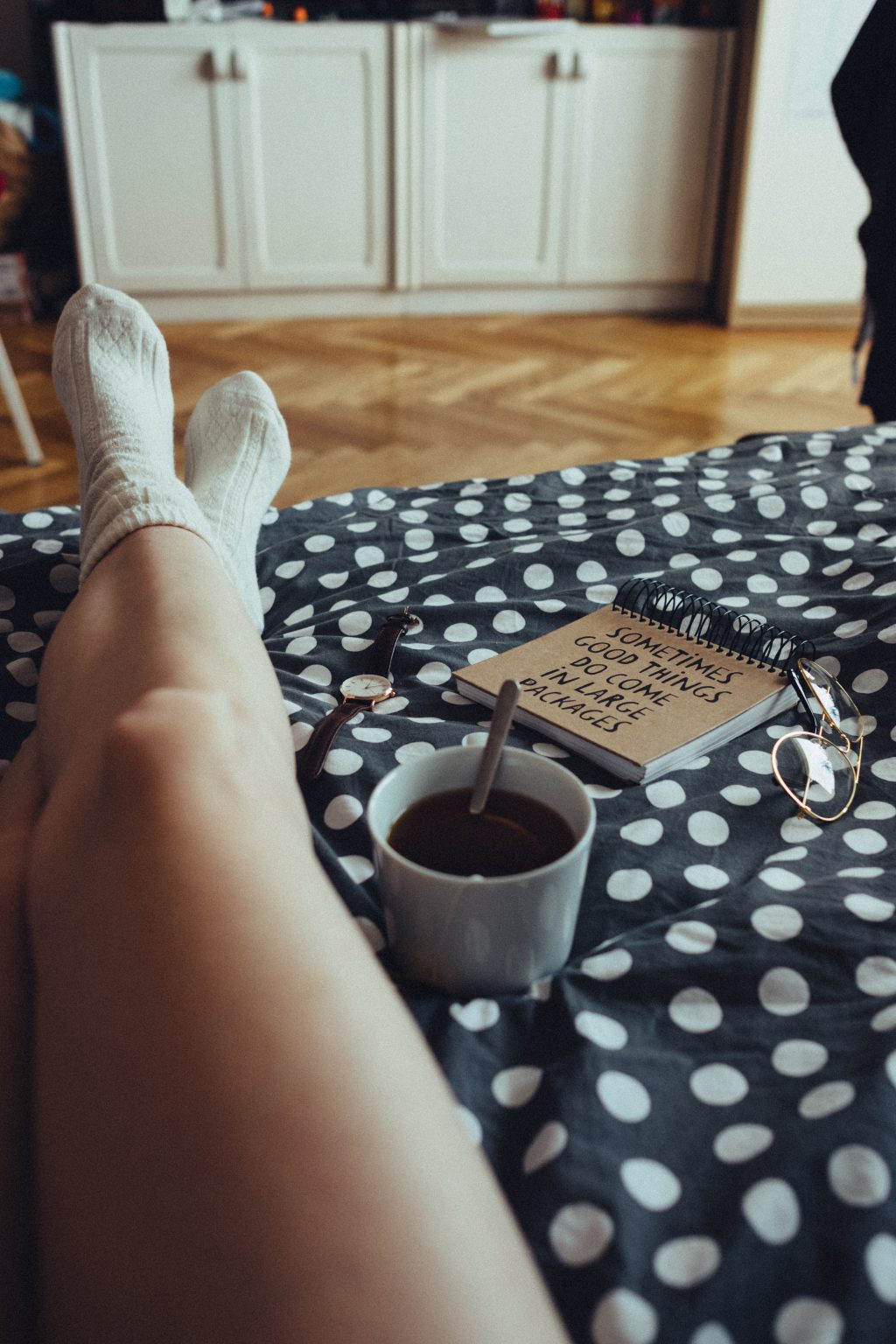 Chilling in bed in woollen socks 3 - free stock photo