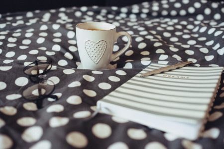 Dreams notebook, glasses and coffeemug - free stock photo