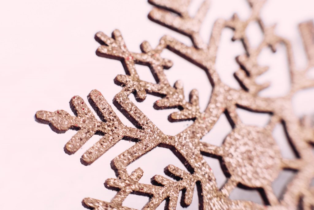 Gold glitter snowflake closeup 2 - free stock photo