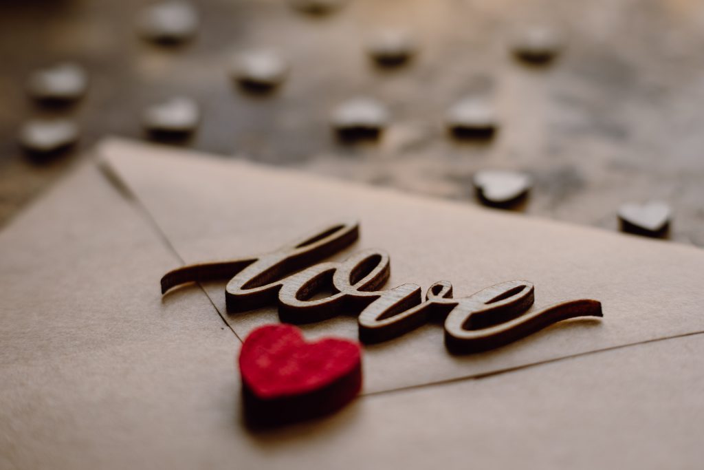 wooden_word_love_on_a_beige_envelope-1024x683.jpg