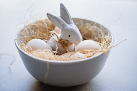 Ceramic Easter Bunny and plain eggs in a bowl - free stock photo