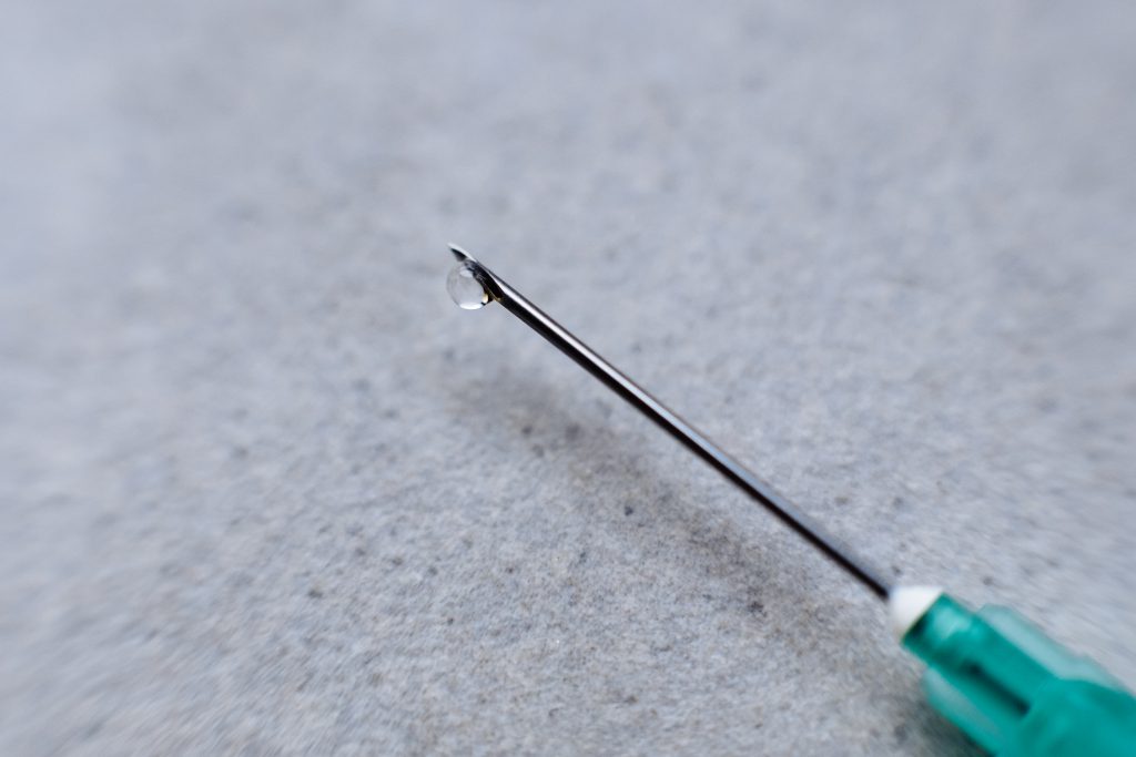 Disposable syringe needle macro - free stock photo