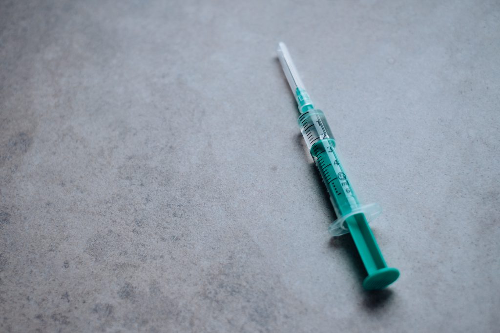 Disposable syringe with medication 3 - free stock photo
