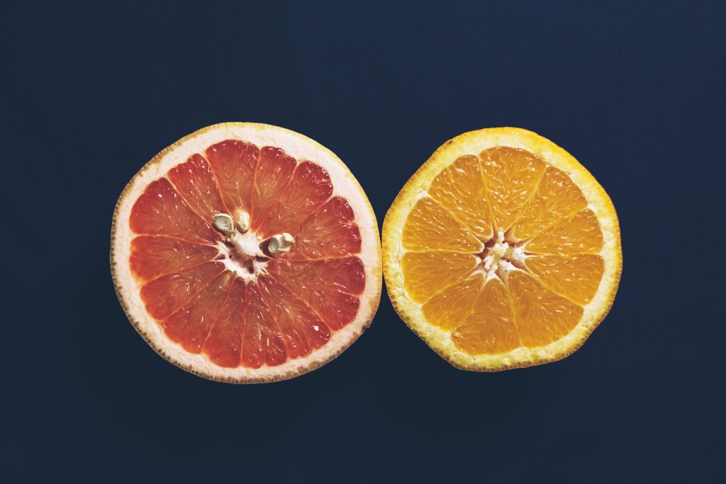 A grapefruit and an orange cut in half 3 - free stock photo