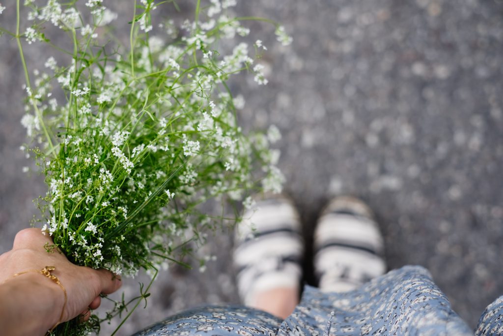 Wild flowers bouquet in a female hand 6 - free stock photo