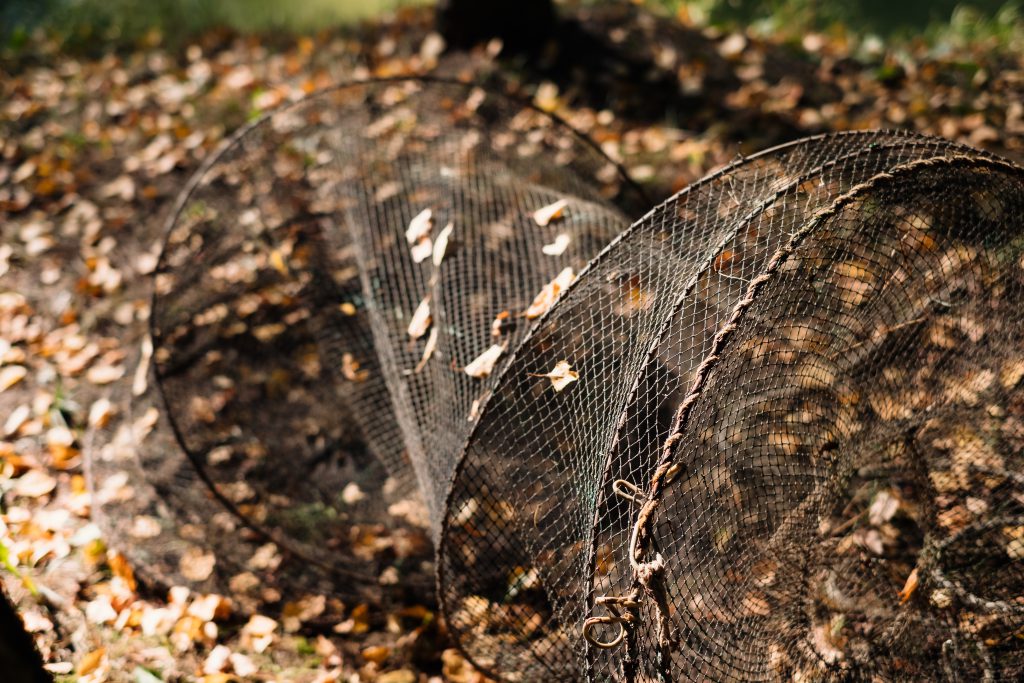 Fish net lying on the ground - free stock photo