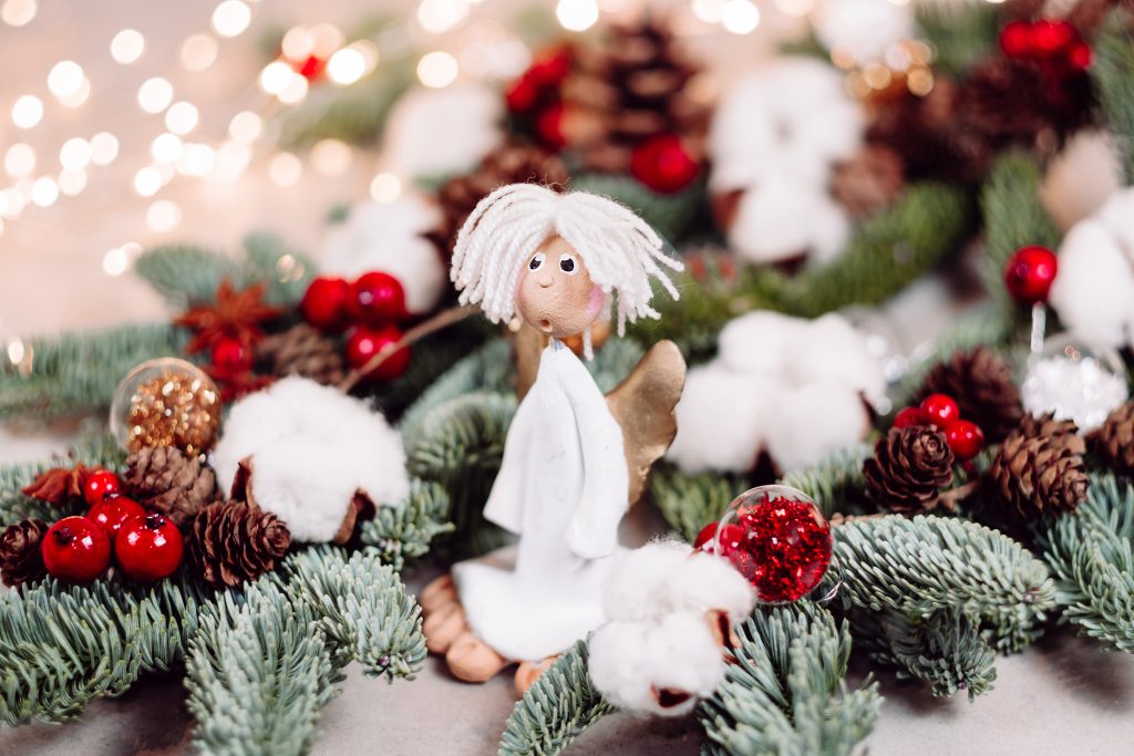 Christmas spruce decoration with an angel - free stock photo