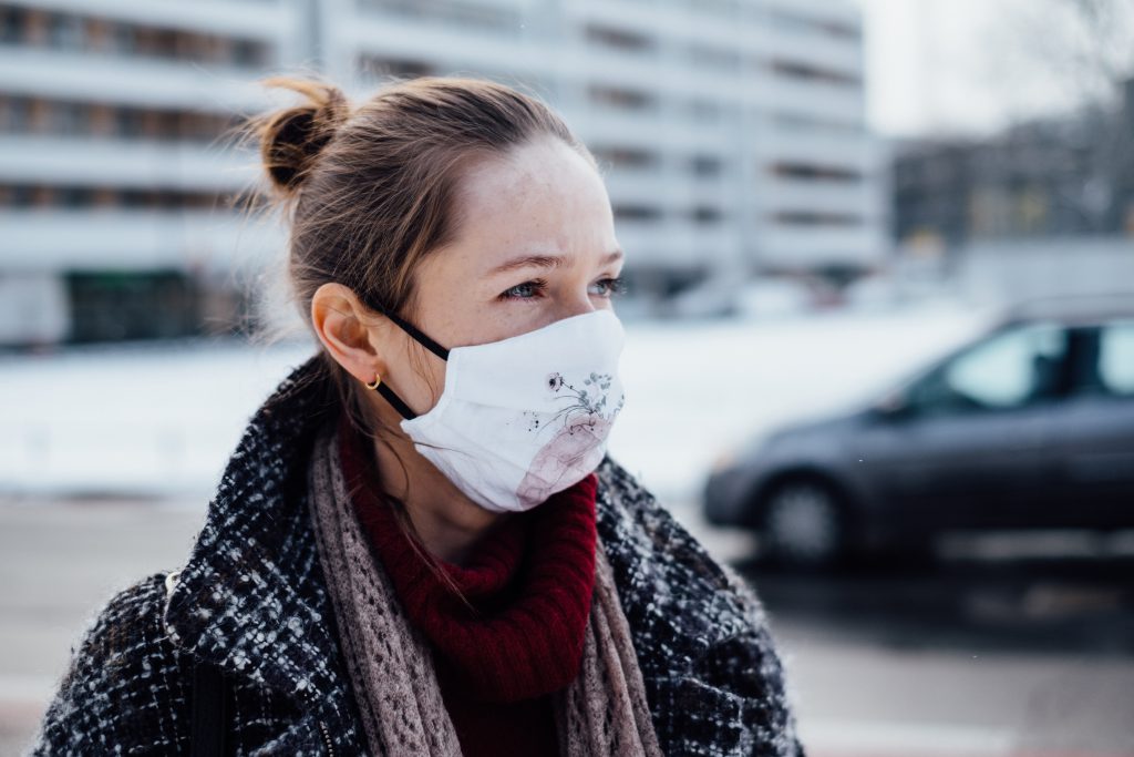 A female wearing a protective face mask 2 - free stock photo