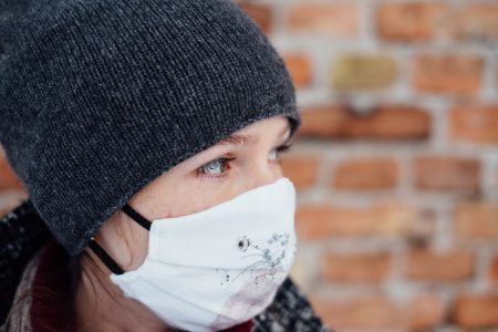 A female wearing a protective face mask closeup 2 - free stock photo