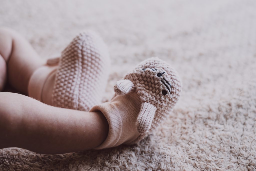 bunny slippers on newborns feet 2