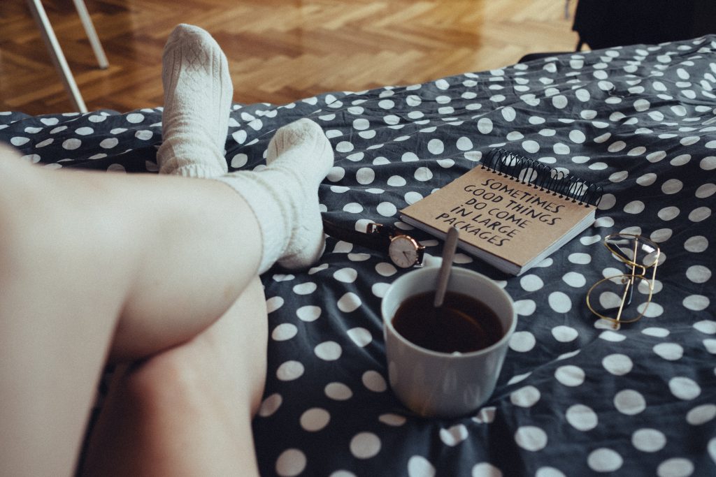 Chilling in bed in woollen socks 4 - free stock photo