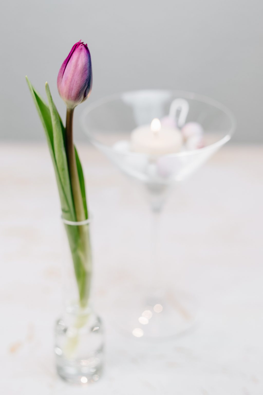 Table candle decoration with a purple tulip 2 - free stock photo