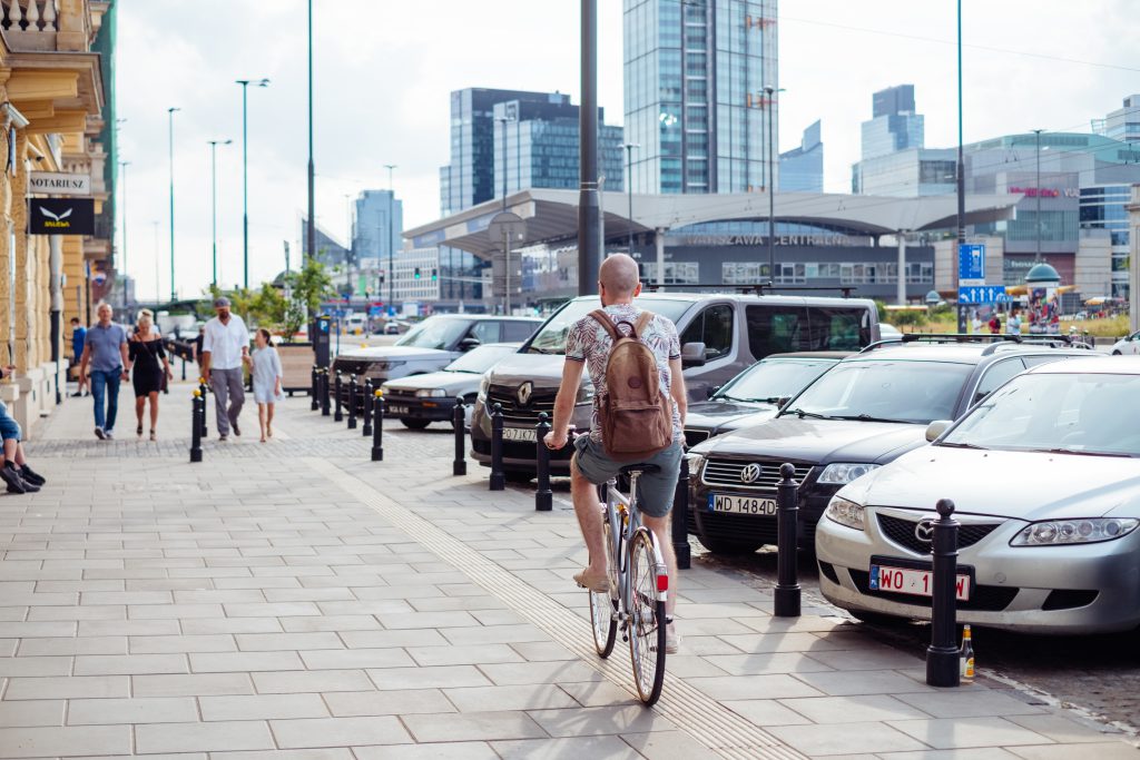 Cyclist riding along the sidewalk - free stock photo