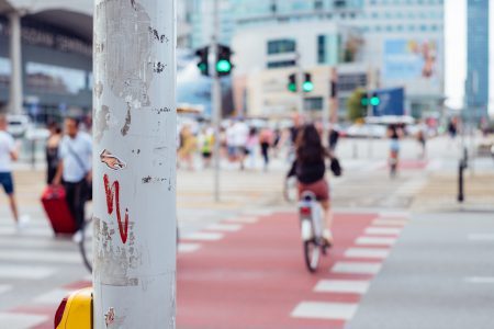 Cyclists and pedestrians crossing the road - free stock photo