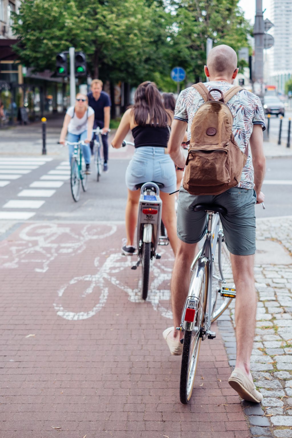 Cyclists crossing the road - free stock photo