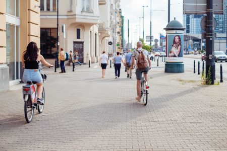 Cyclist riding along the sidewalk - free stock photo