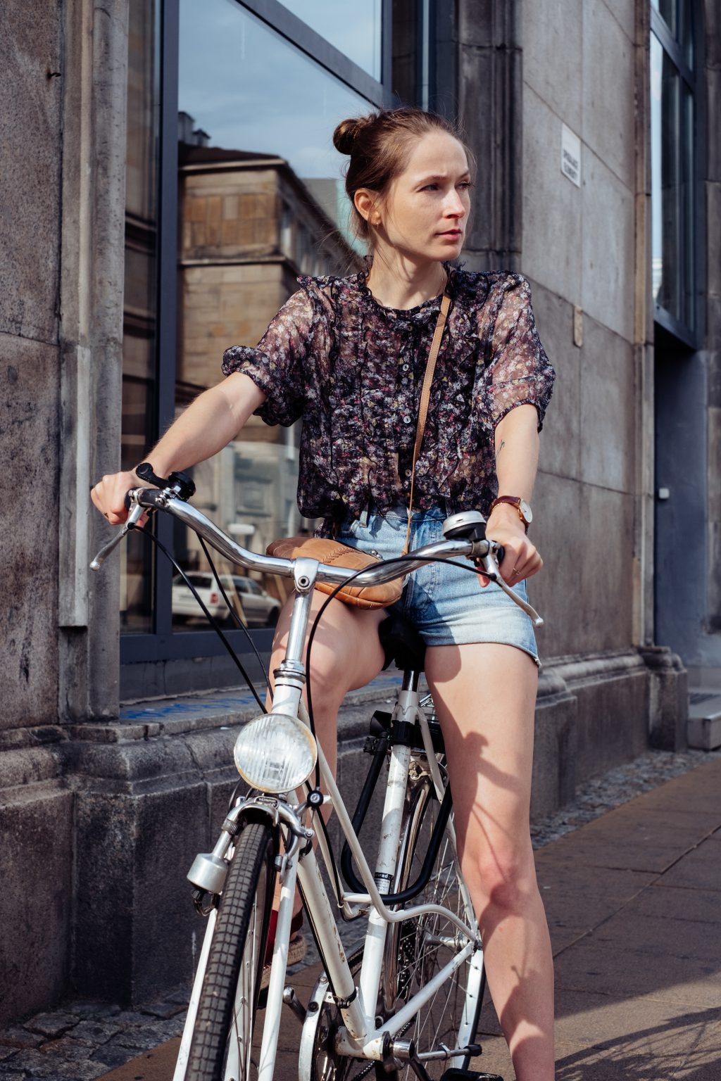 Female on a bicycle in the city 3 - free stock photo