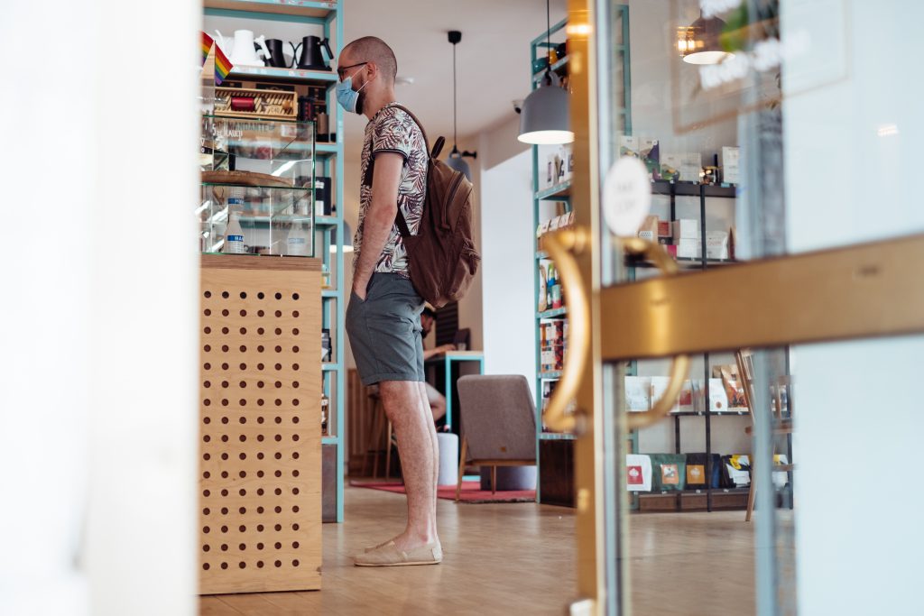 male_customer_waiting_at_the_counter_in_