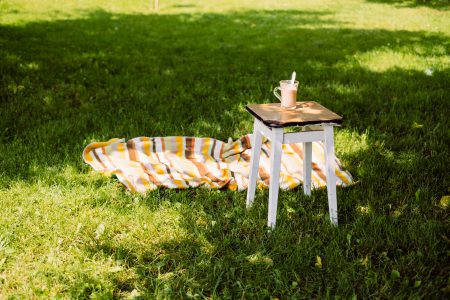 Cup of coffee on a vintage stool outdoors 2 - free stock photo