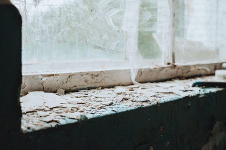Abandoned ruined building window sill - free stock photo