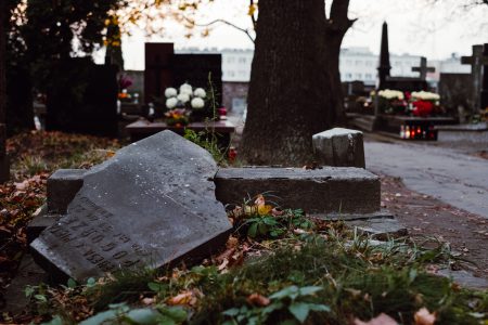 An old damaged grave at the cemetery - free stock photo