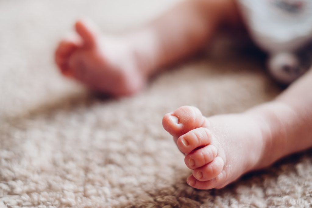 Newborn baby’s feet - free stock photo