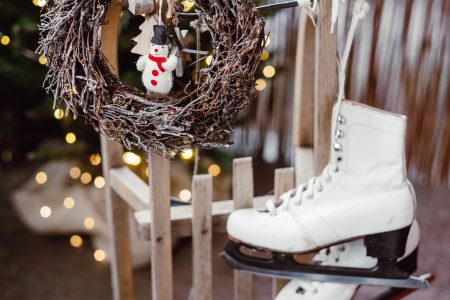 Christmas wreath and vintage ice skates on a wooden sled 2 - free stock photo
