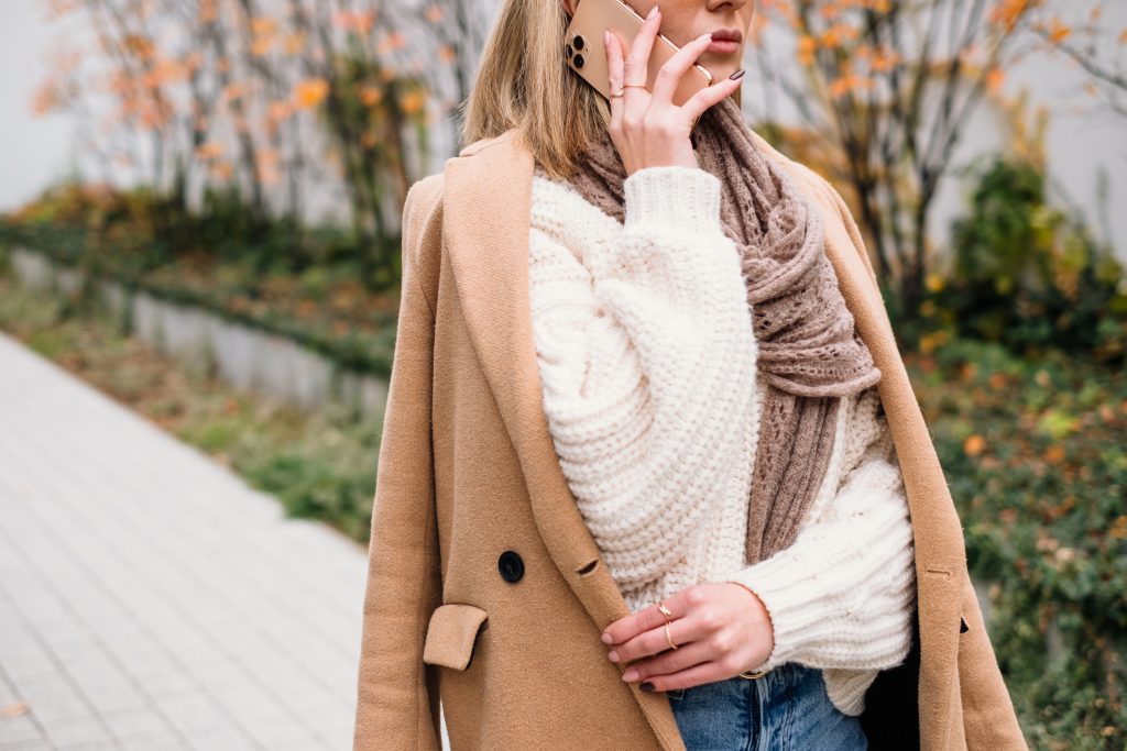 A female talking on the phone on an autumn day 2 - free stock photo